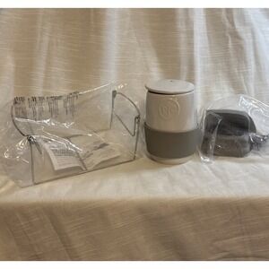 Lot of Pampered Chef ,Wire Cradle, Cut N Seal(both still in wrapper), Egg Cooker